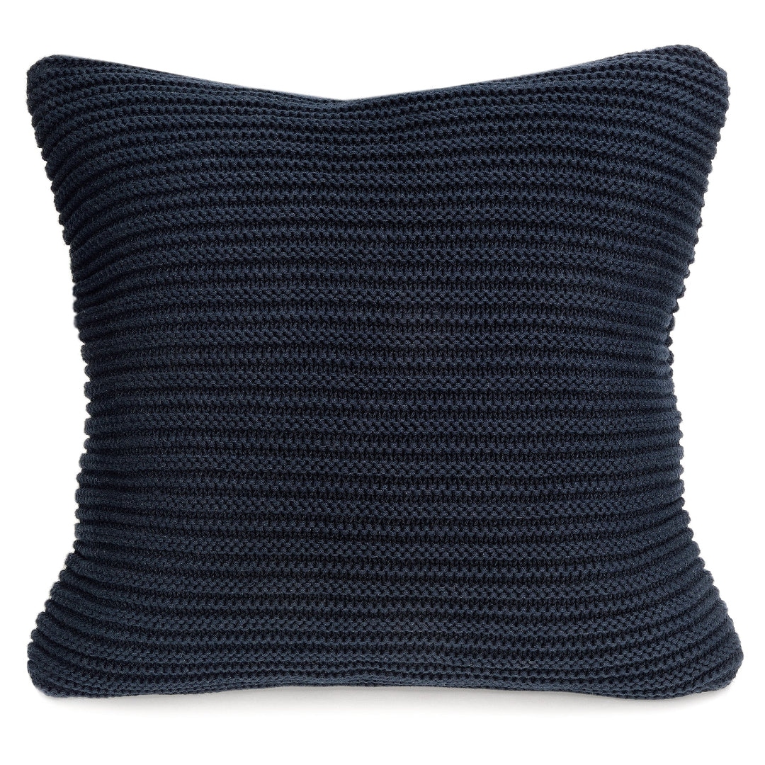 A navy textured knit throw pillow