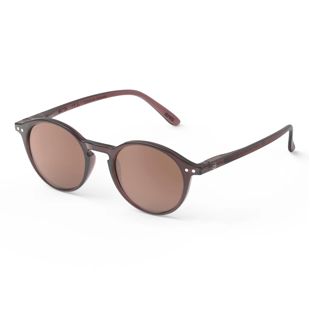 Round sunglasses with brown lenses on a white background