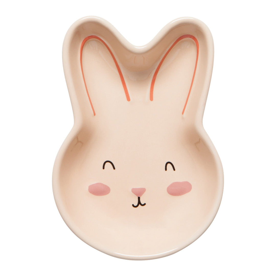 Ceramic bunny-shaped bowl with a face on a white background