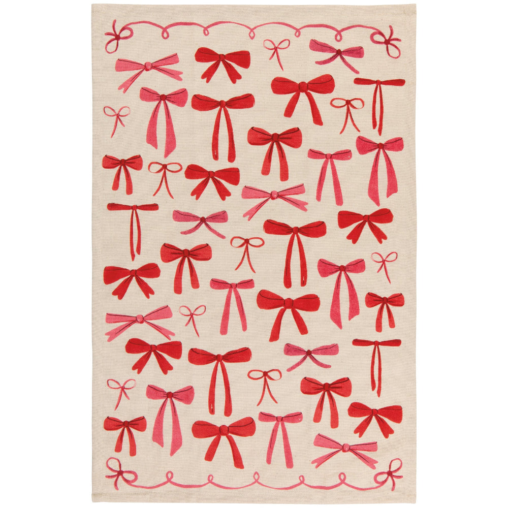 Beige towel with red bow pattern