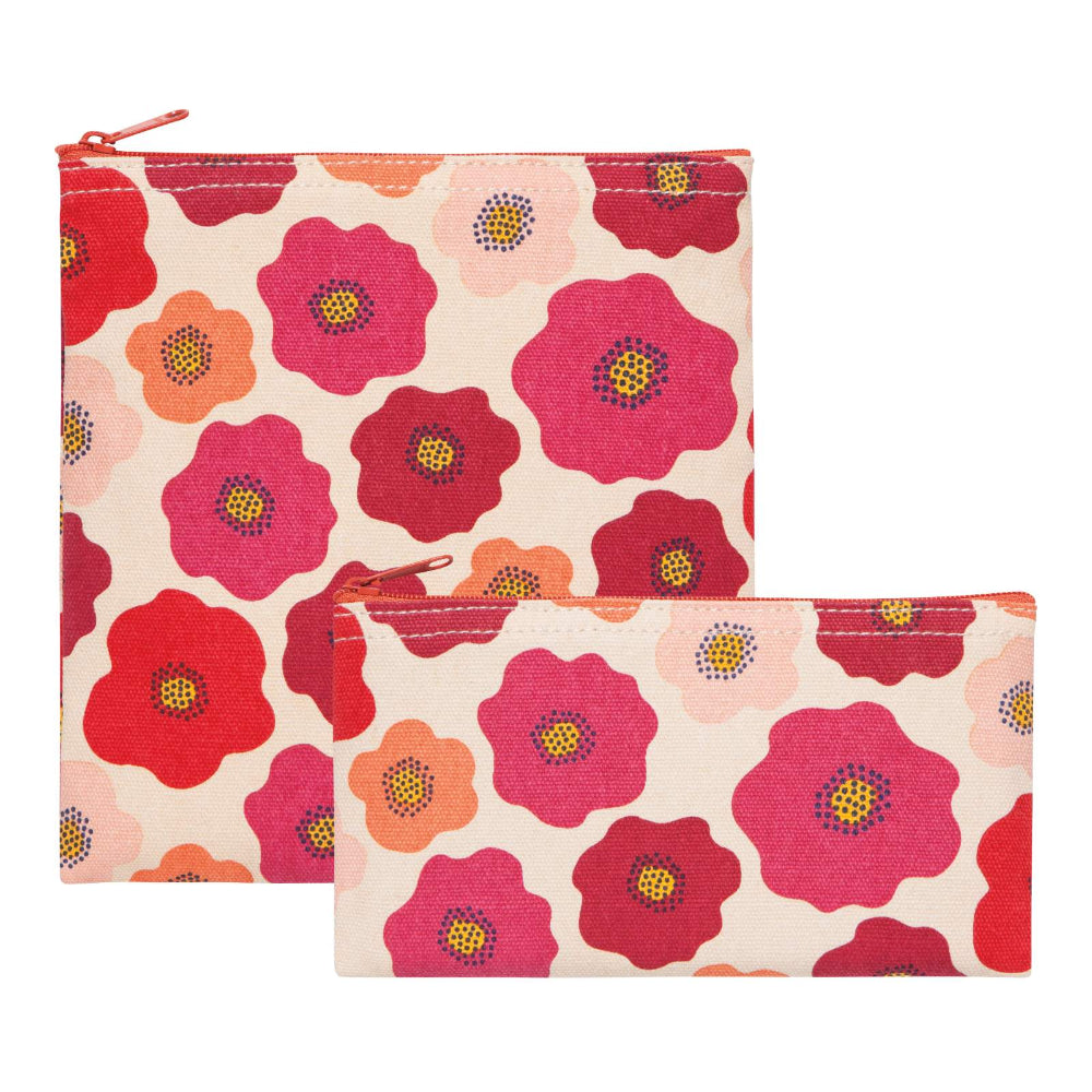 Two floral-patterned pouches with pink and red flowers on a beige background.