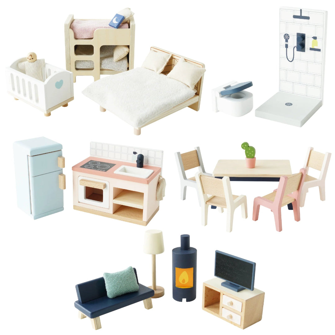 Collection of miniature furniture pieces on a white background