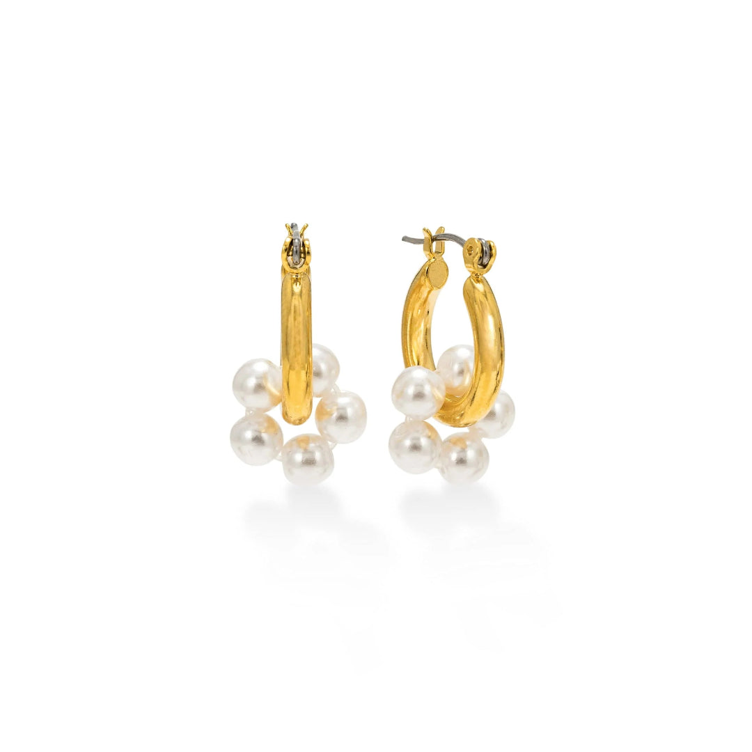 A pair of gold-plated hoop earrings with white pearl clusters attached to them.