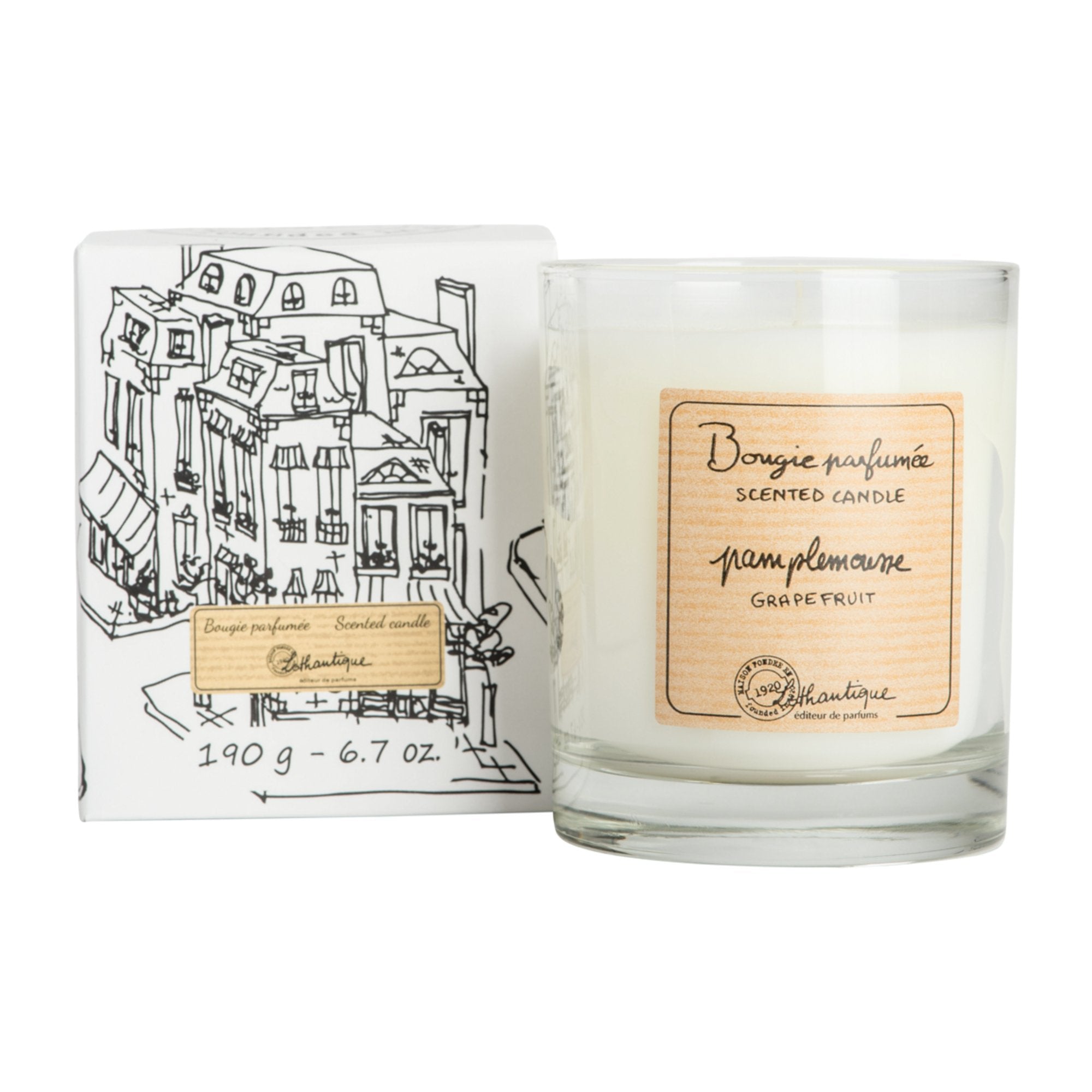 Scented candle with packaging featuring a building illustration on a white background