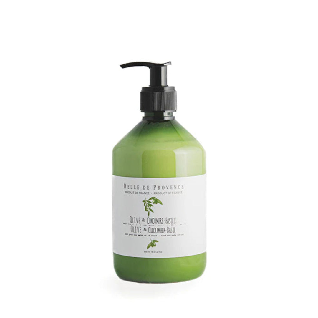 Green bottle with pump dispenser on a white background