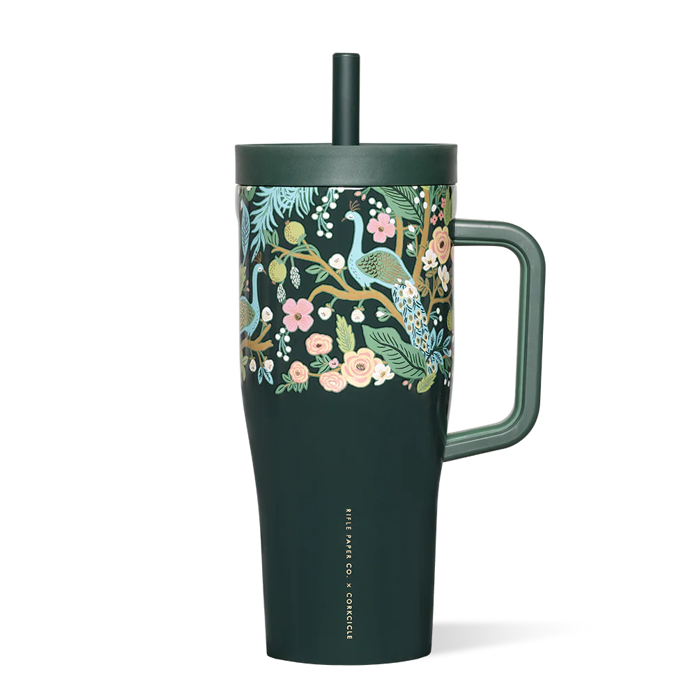 Dark green tumbler with floral and peacock design on a white background