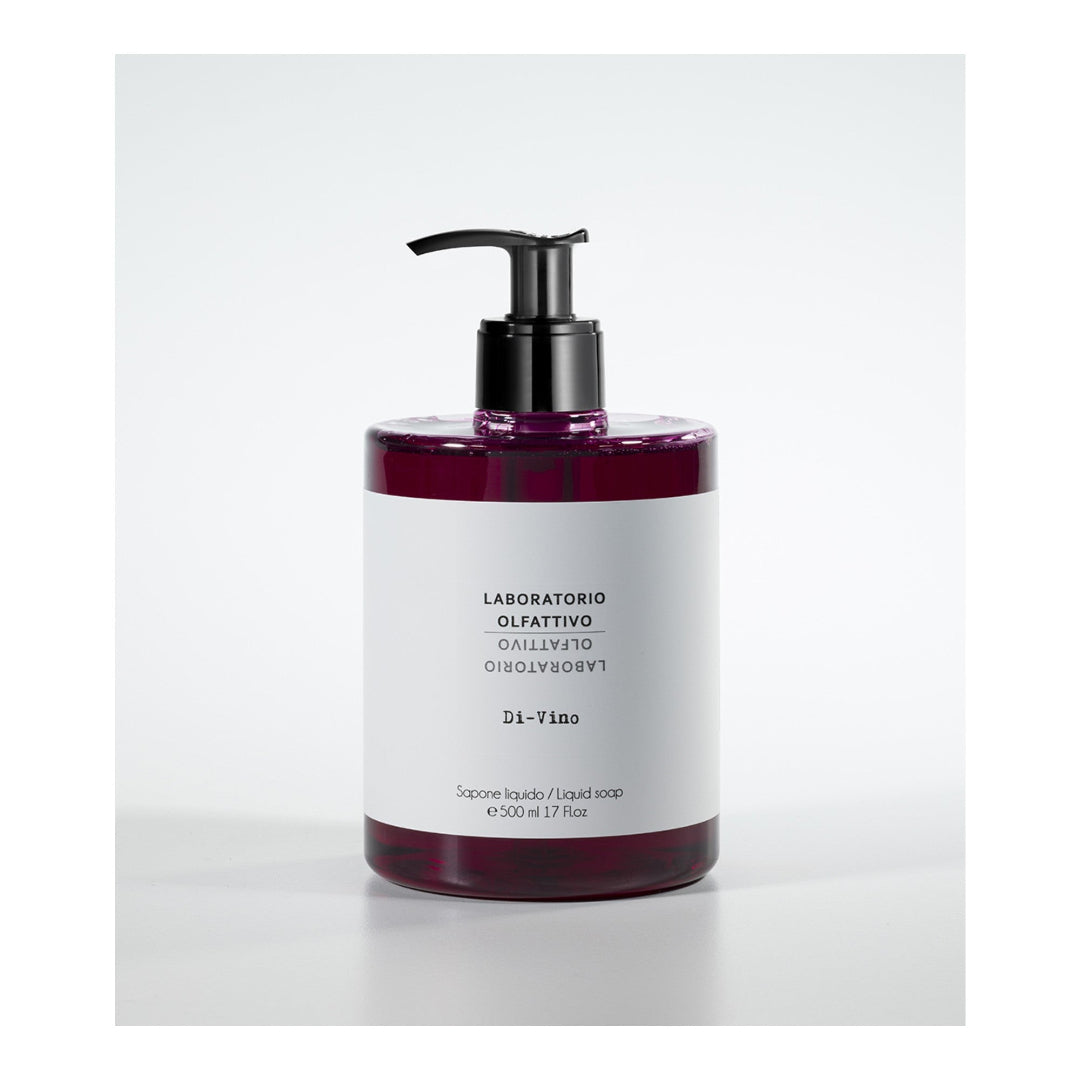 Liquid soap bottle with pump on a white background