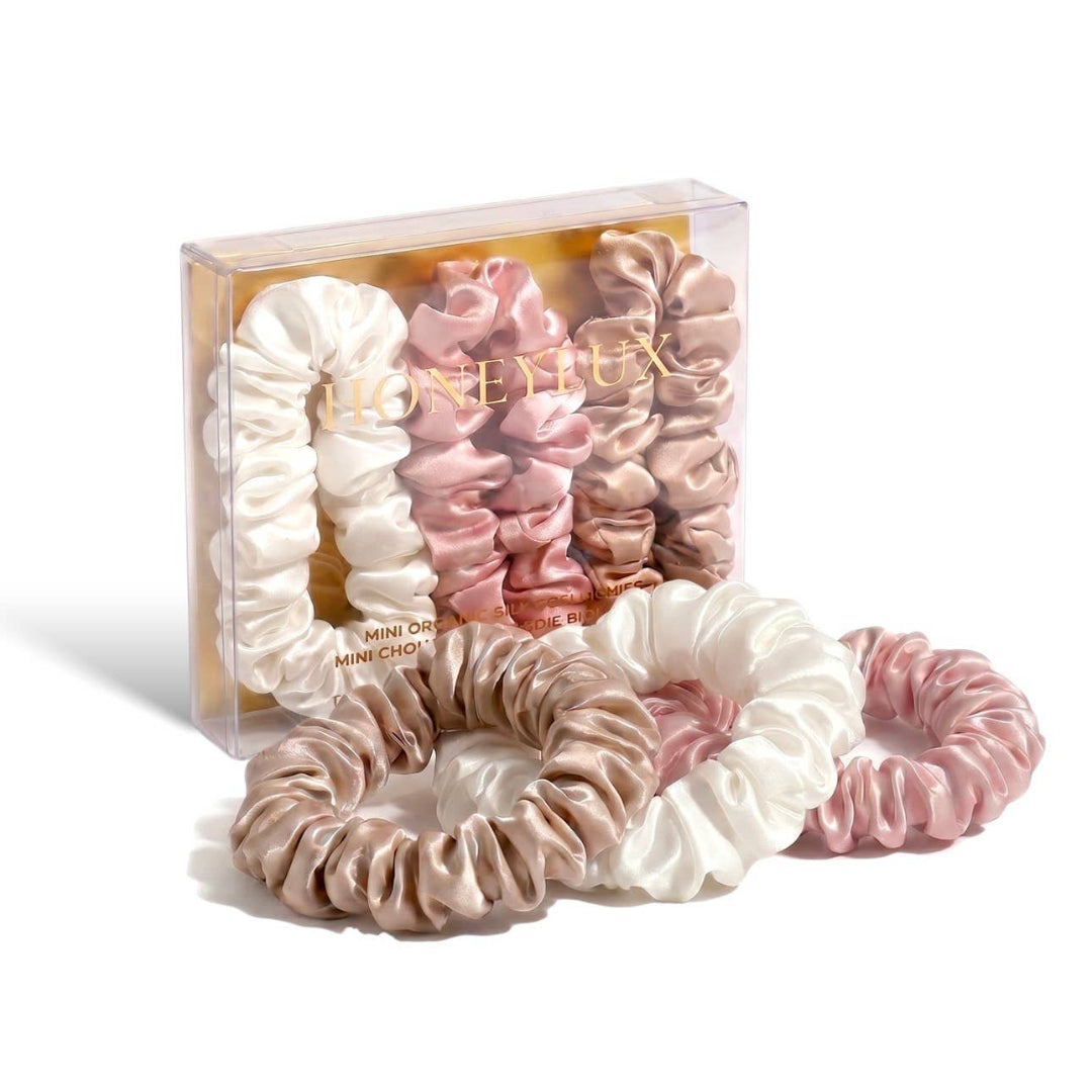 Set of pink and white scrunchies with 'Honeylux' branding on a white background