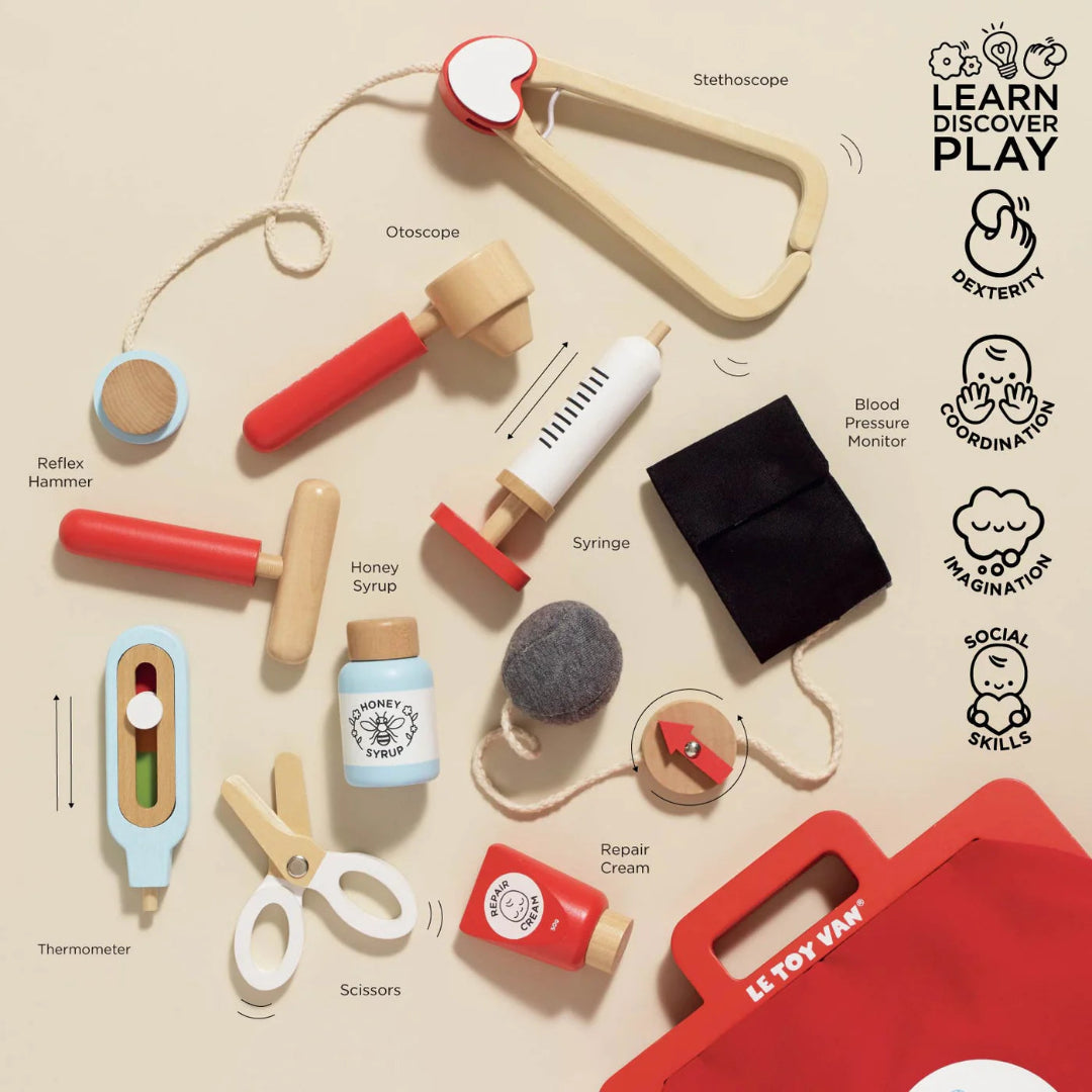 Collection of toy medical tools on a beige background with 'LE TOY VAN' branding.