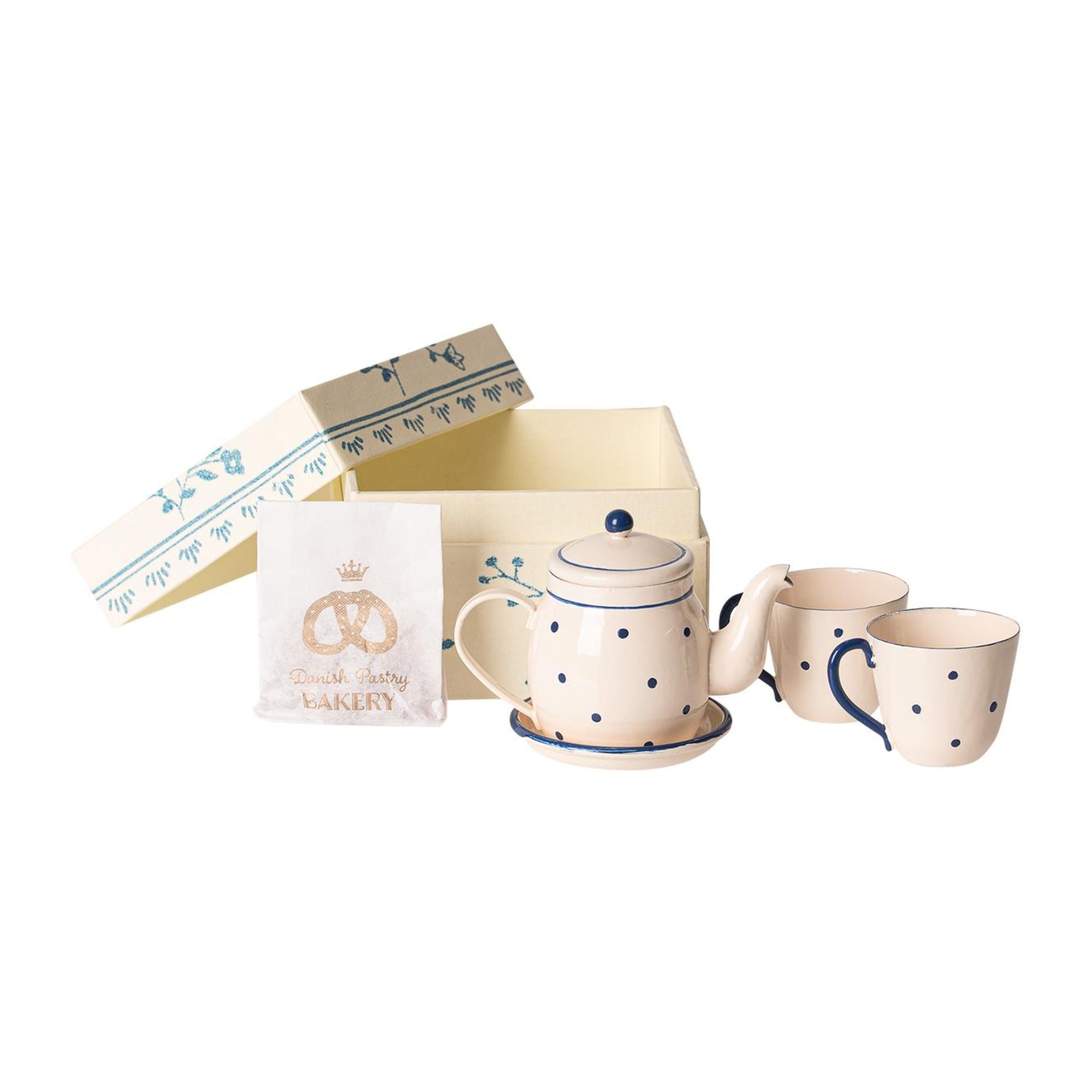 Ceramic tea set with teapot and mugs in a decorative box on a white background