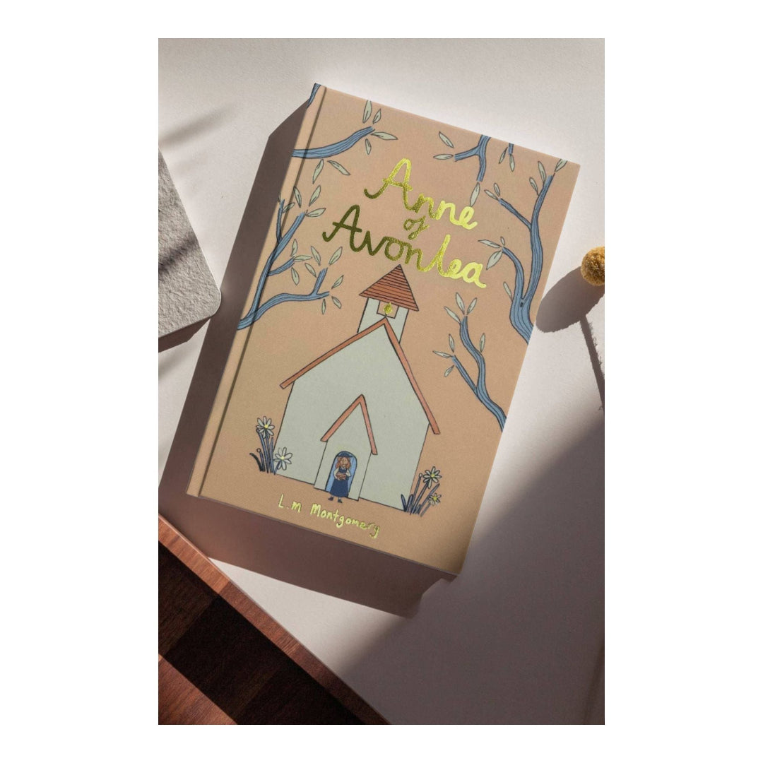 Book titled 'Anne of Avonlea' with a cover illustration on a light surface.