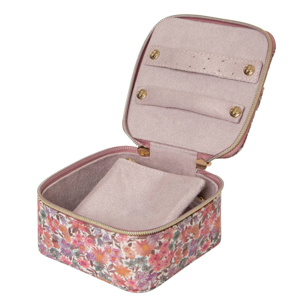 Floral jewelry case with a pink interior on a white background