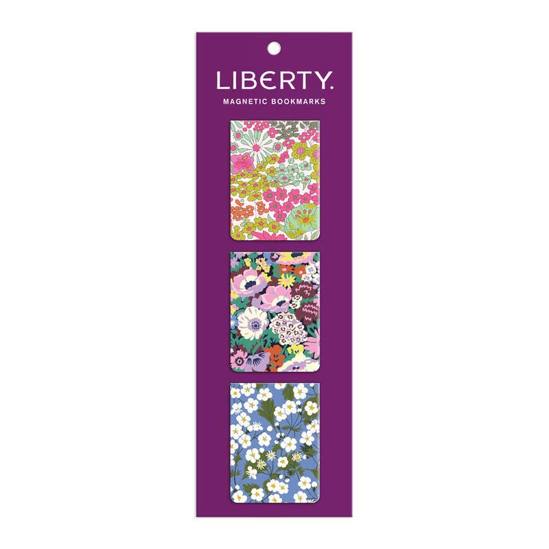 Pack of Liberty magnetic bookmarks with floral designs on a purple card.