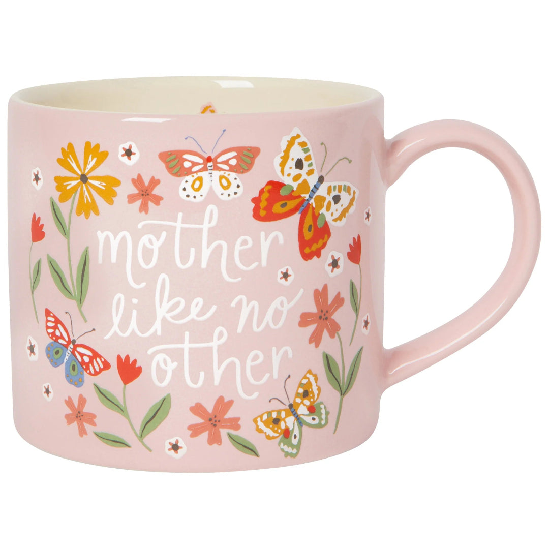 Pink mug with butterfly and floral design and text 'mother like no other' on a white background