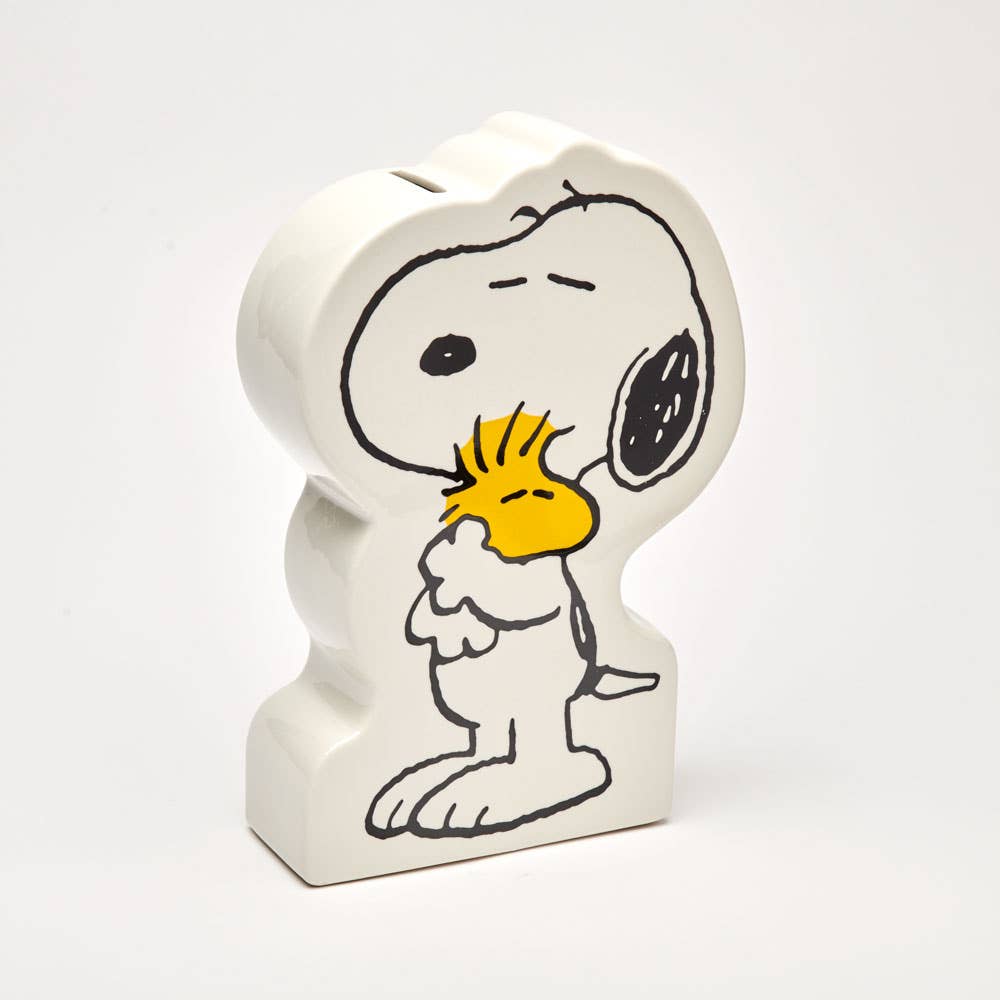 White ceramic Snoopy bank with a Woodstock character design on a white background