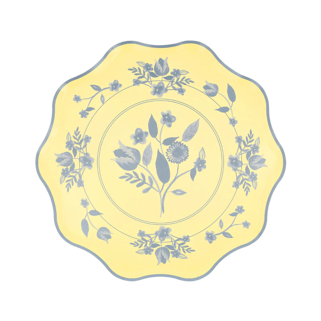 Yellow plate with floral patterns on a white background