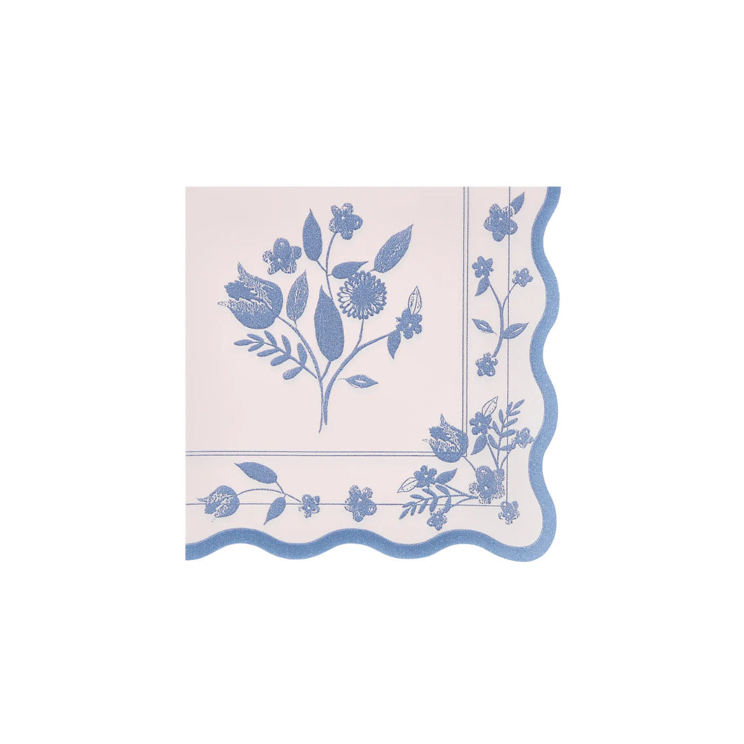 Floral-patterned paper napkin with blue design on a white background
