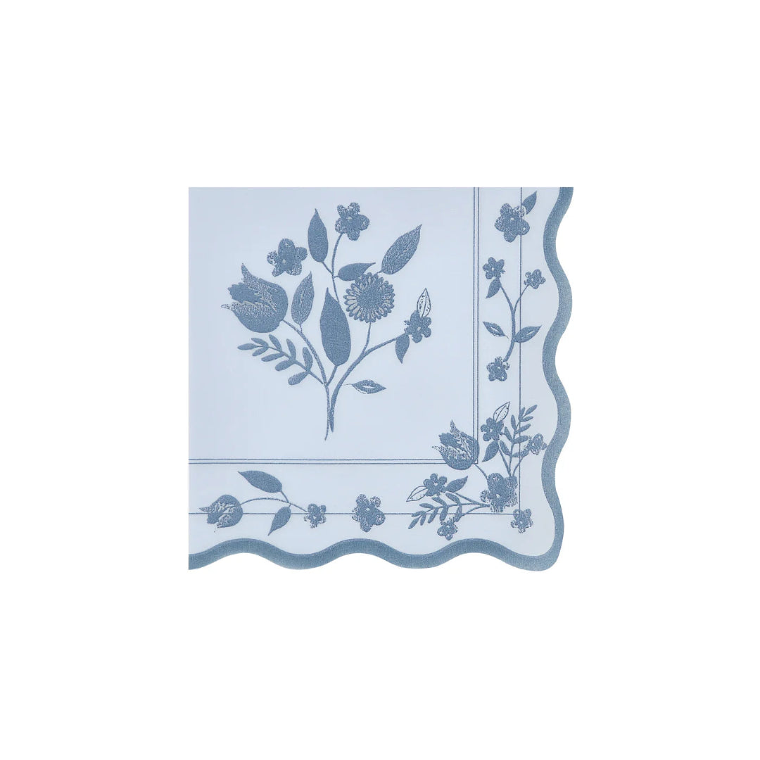 Decorative blue floral paper napkin on a white background
