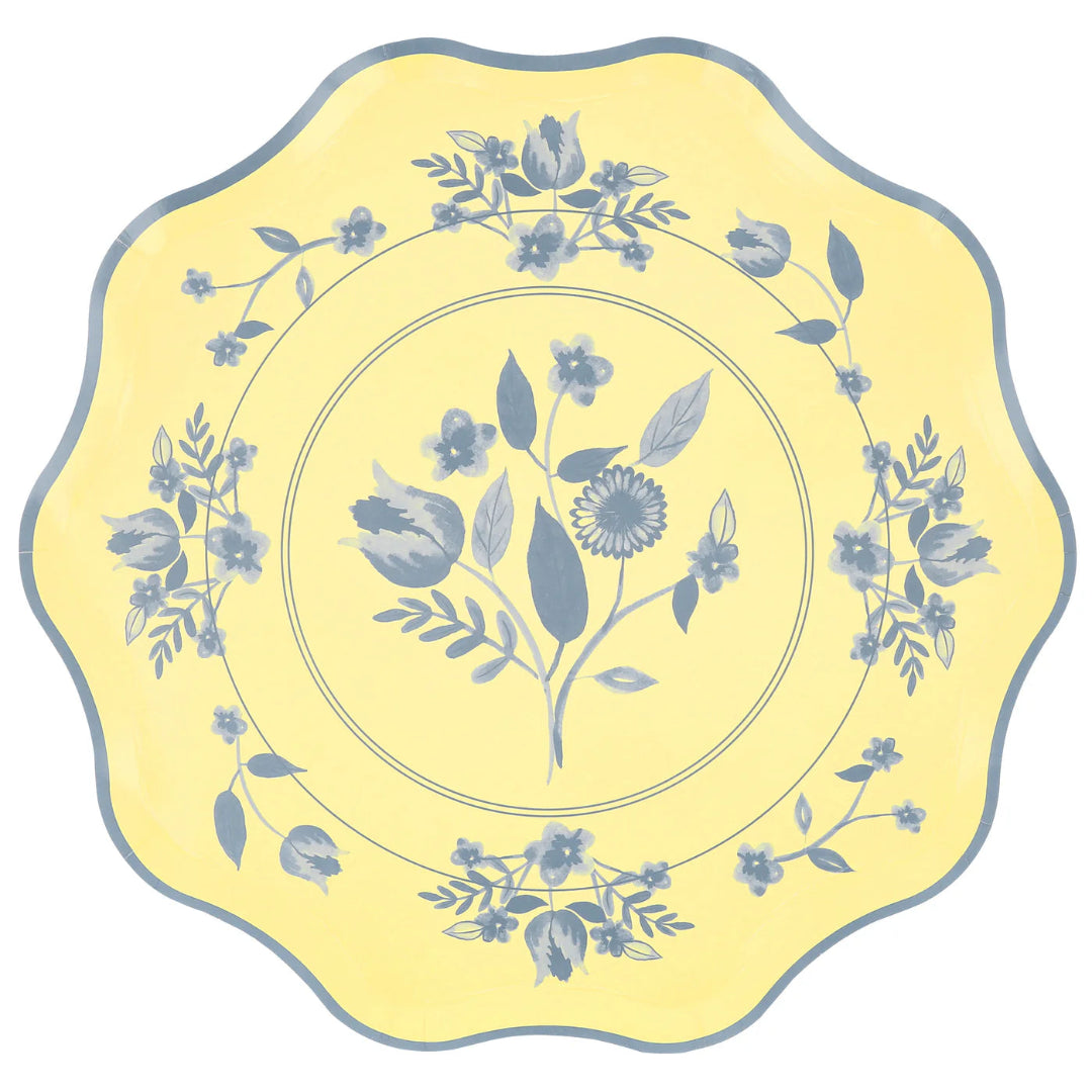 Decorative plate with floral design on a yellow background