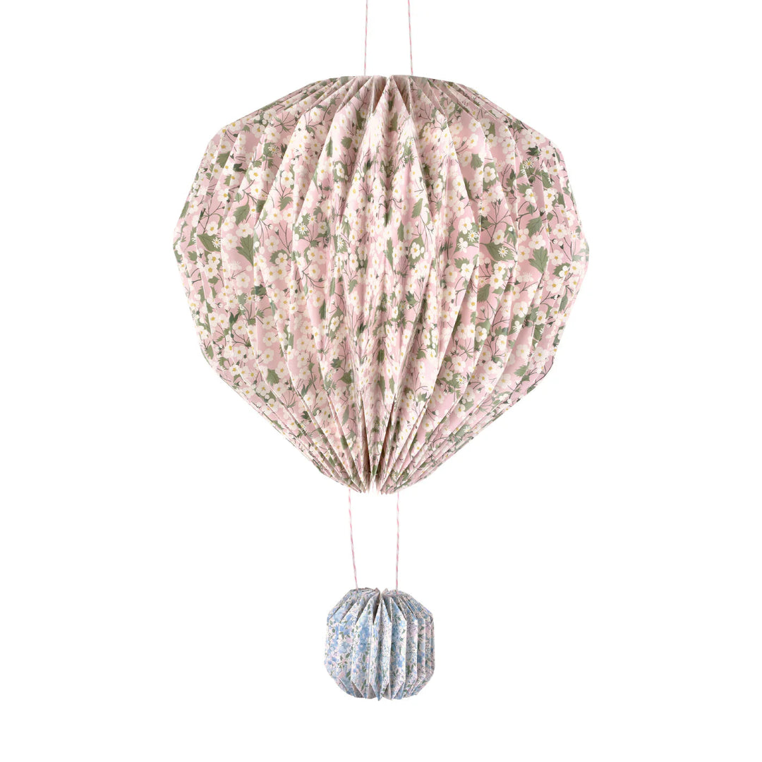 Floral-patterned hot air balloon decoration on a white background