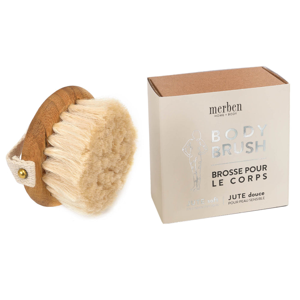A beige jute body brush with bamboo top, next to its packaging box which has 'body brush' written on it.