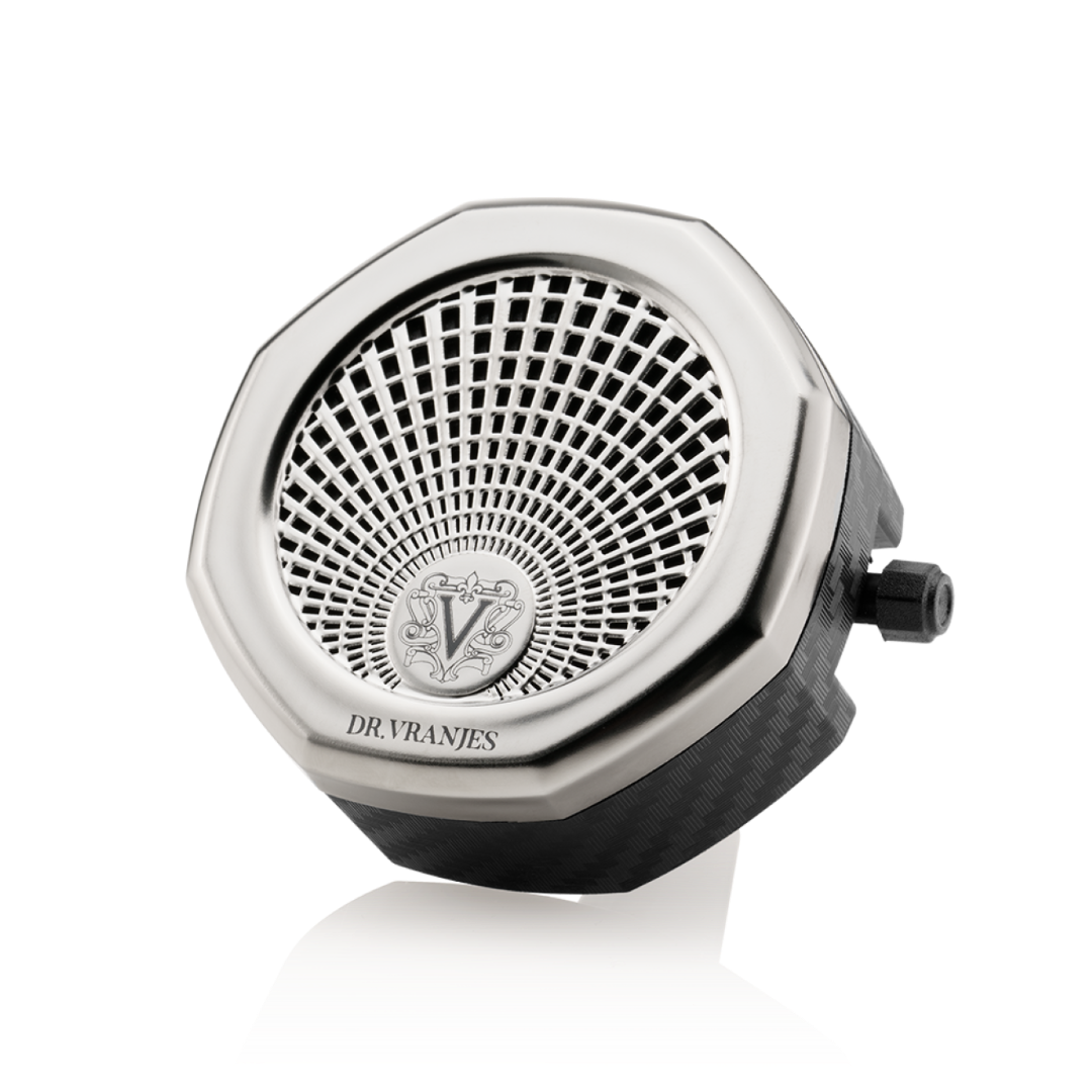 A nickel finish Carparfum diffuser with active ventilation system designed for use in vehicles.