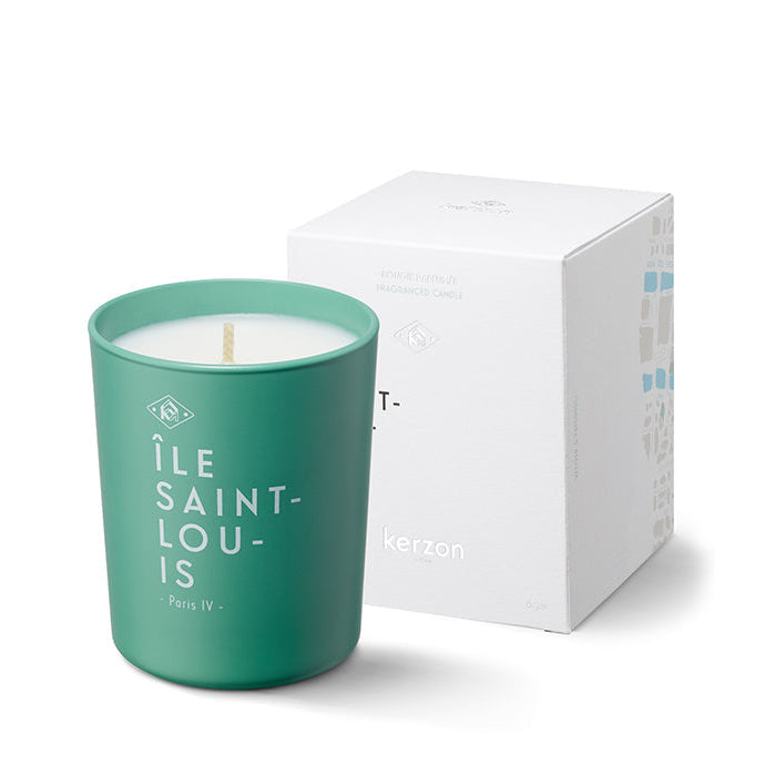 A green glass candle with white wax, branded with 'Ile Saint-Louis' and the Kerzon logo, next to its white box packaging.