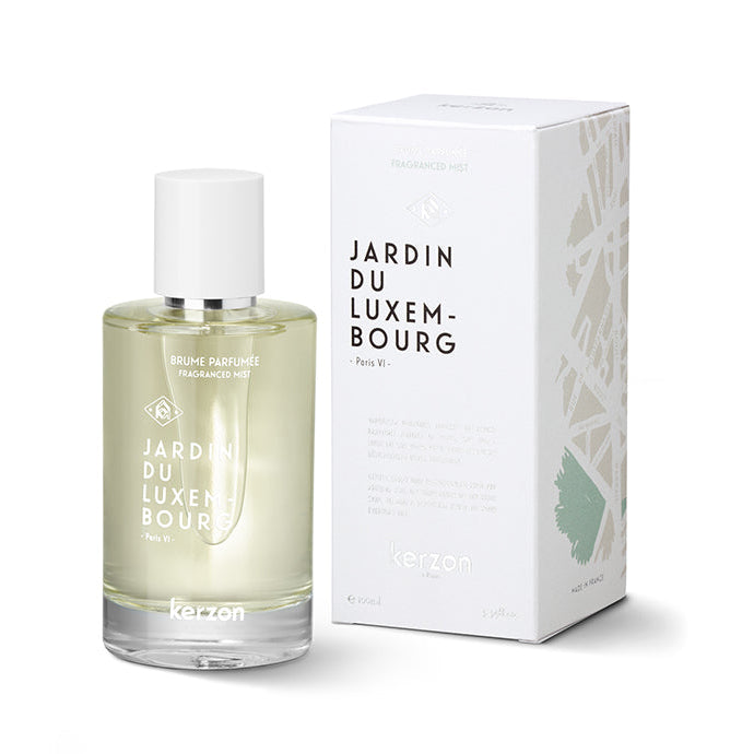 A bottle of Kerzon Jardin de Luxembourg fragranced mist with its packaging box, featuring a white design with floral elements.