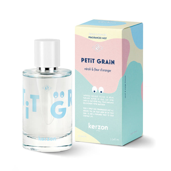 A bottle of Kerzon Petit Grain fragranced mist with its packaging box, featuring pastel colors and citrus illustrations.