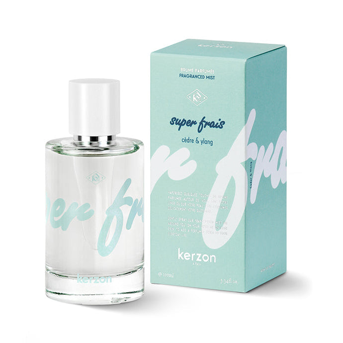 A bottle of Kerzon Super Frais Fragranced Mist with its packaging box, featuring a light aqua color and white typography.