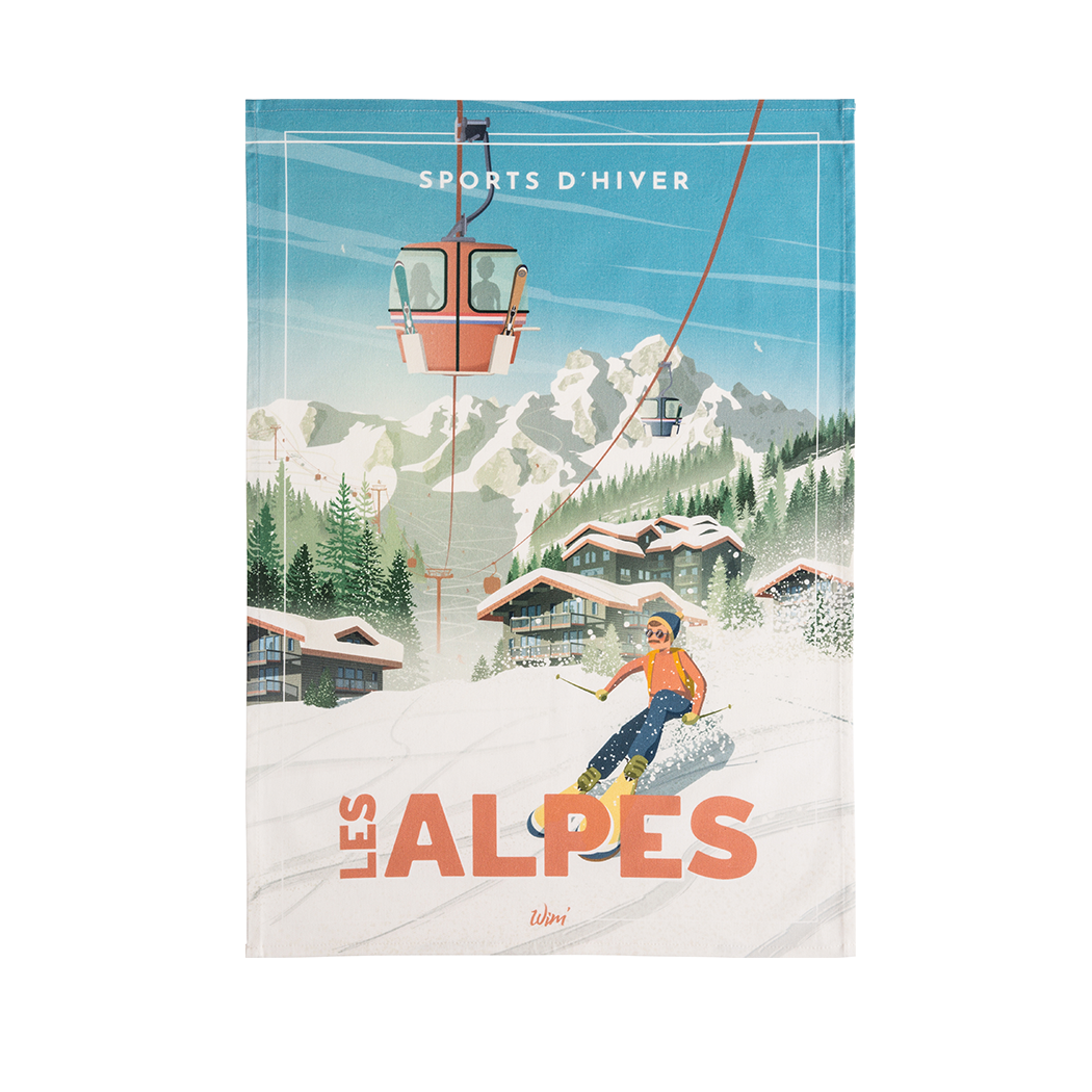 A tea towel with a printed design depicting a winter sports scene, titled 'LES ALPES' with a skier and mountains.