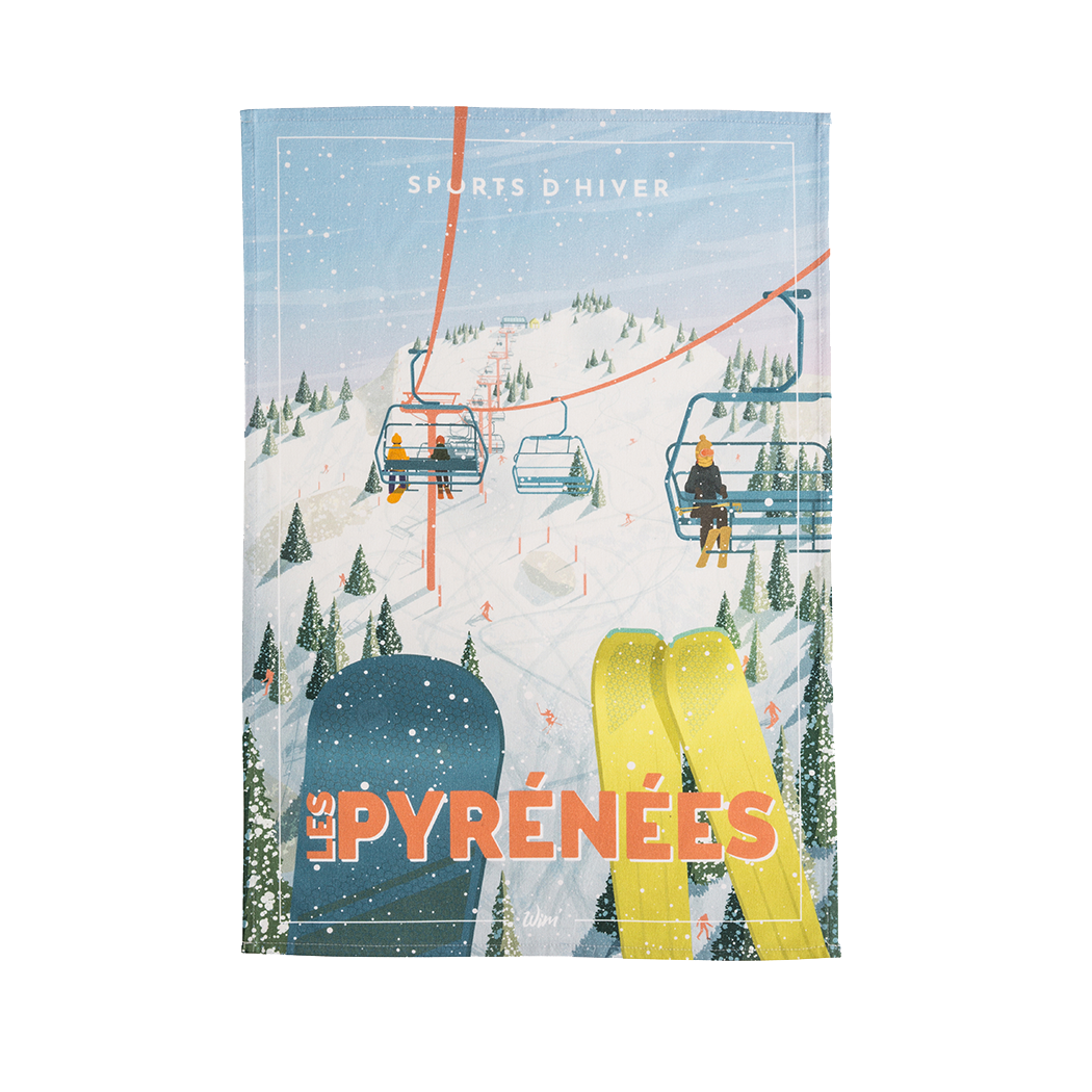 A multicolored cotton tea towel with a printed design depicting a winter sports scene and the text 'Les Pyrénées'.