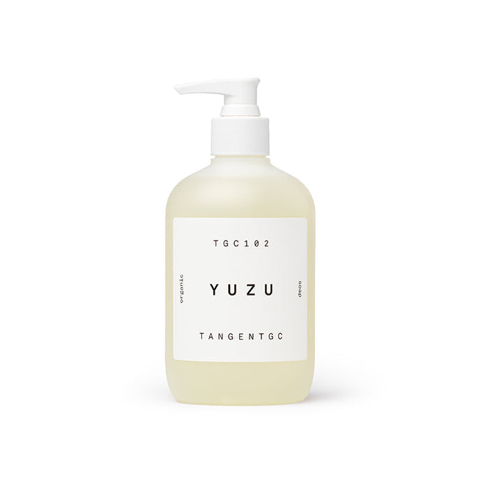 A pump bottle of Tangent GC Yuzu Soap with a white label featuring the product name and a minimalist design.
