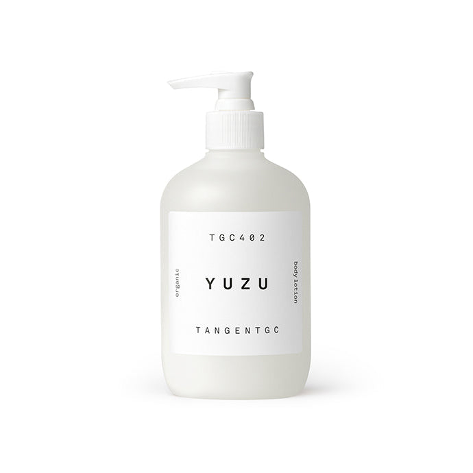 A white pump bottle labeled 'YUZU TANGENT GC' indicating the citrus fragrance component, with a capacity of 350ml.