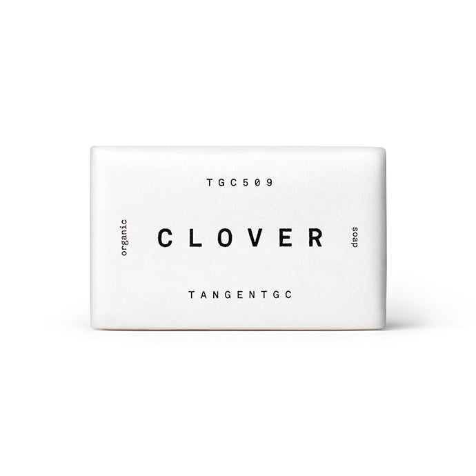 A bar of soap with 'Clover' and 'Tangent C' text on its white packaging, indicating the fragrance.